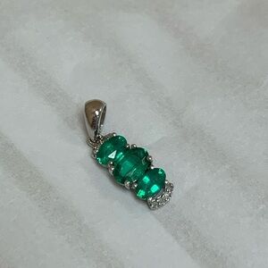 D’joy sterling silver with emerald colored stones